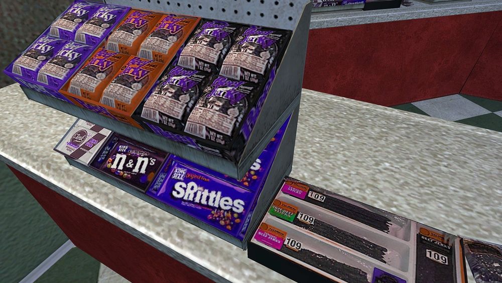 An original candy display from VTM Bloodlines. Visible are three varieties of Beef Jerky, Stork peppermint patties, n&n's, and Srittles.