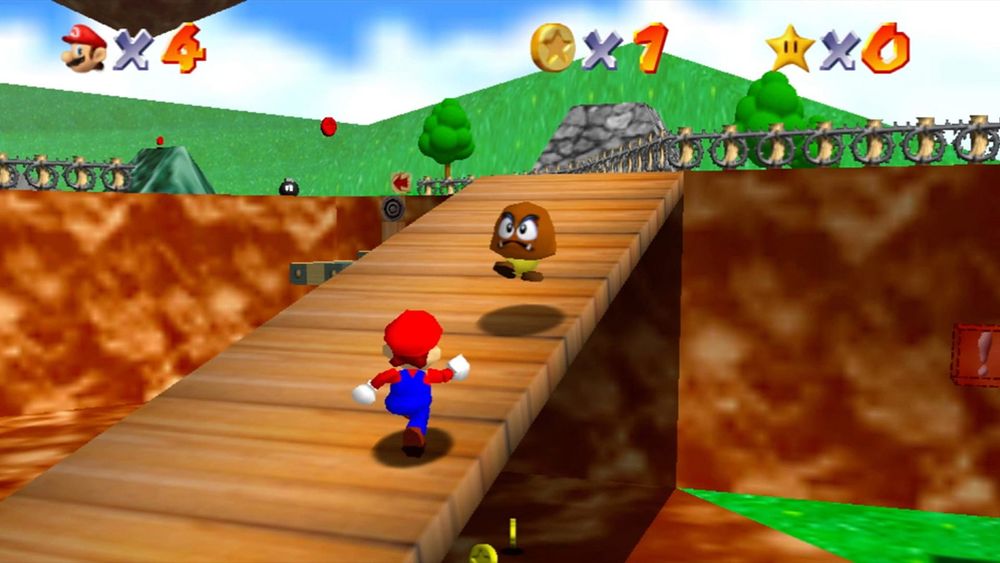 Screenshot of the game showing the stage Bomb Bomb Battlefield. The main character Mario is located on a bridge facing a goomba enemy. In the background you can see parts of the stage like some grassy hills, some trees and the underside of a floating island.