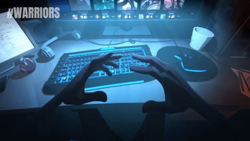 a person 's hands are on a keyboard in front of a computer screen with #warriors written on it