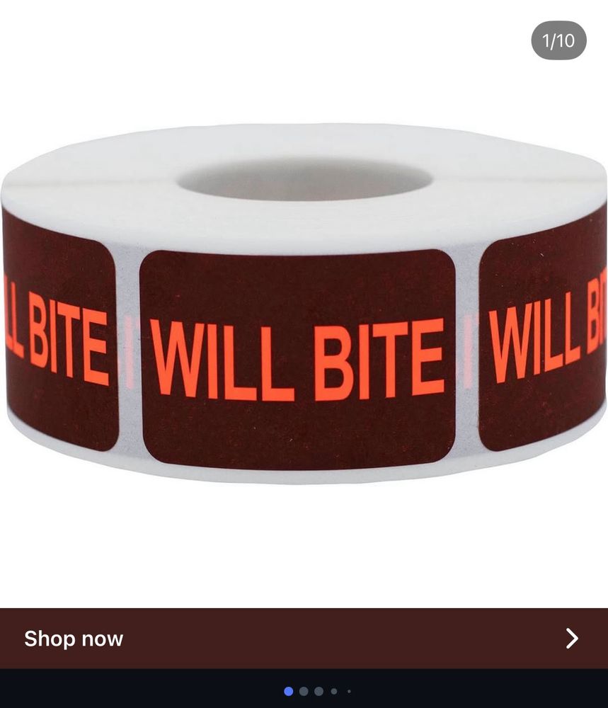 Color image cropped from Instagram of a roll of adhesive labels in brown with text.

Text: “Will Bite”