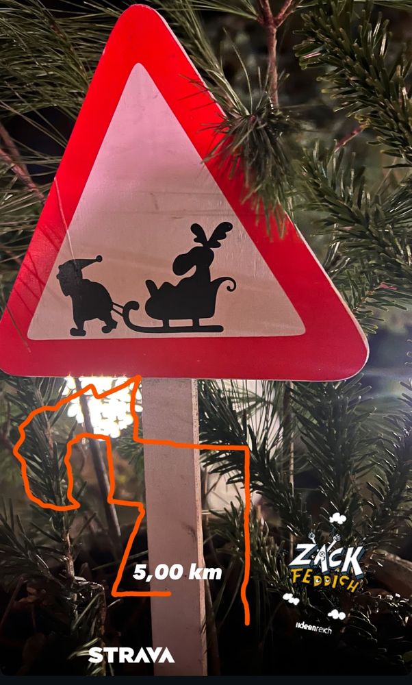 Weihnachtliches Verkehrszeichen mit Weihnachtsmann der einen Schlitten samt Rentier zieht. Dazu eine Abbildung des Streckenverlaufs mit km-Angabe 