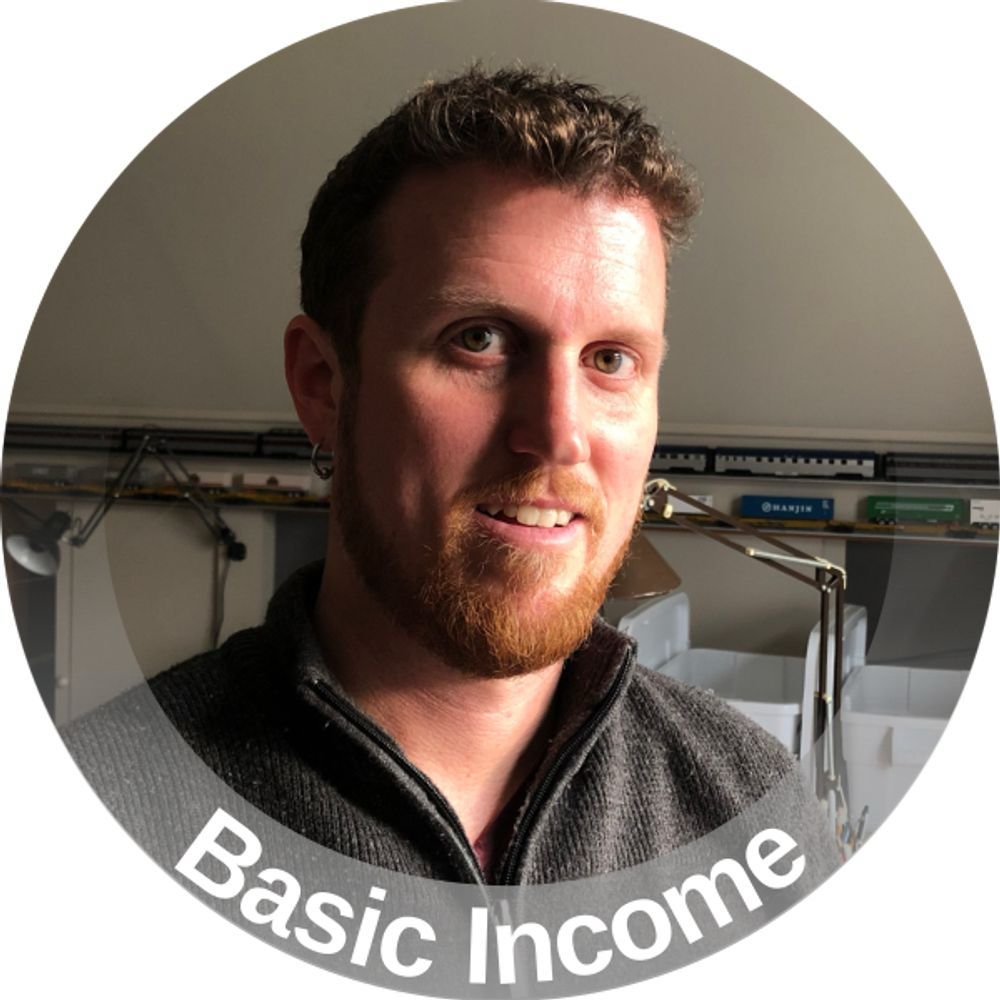 My profile picture with a basic income banner