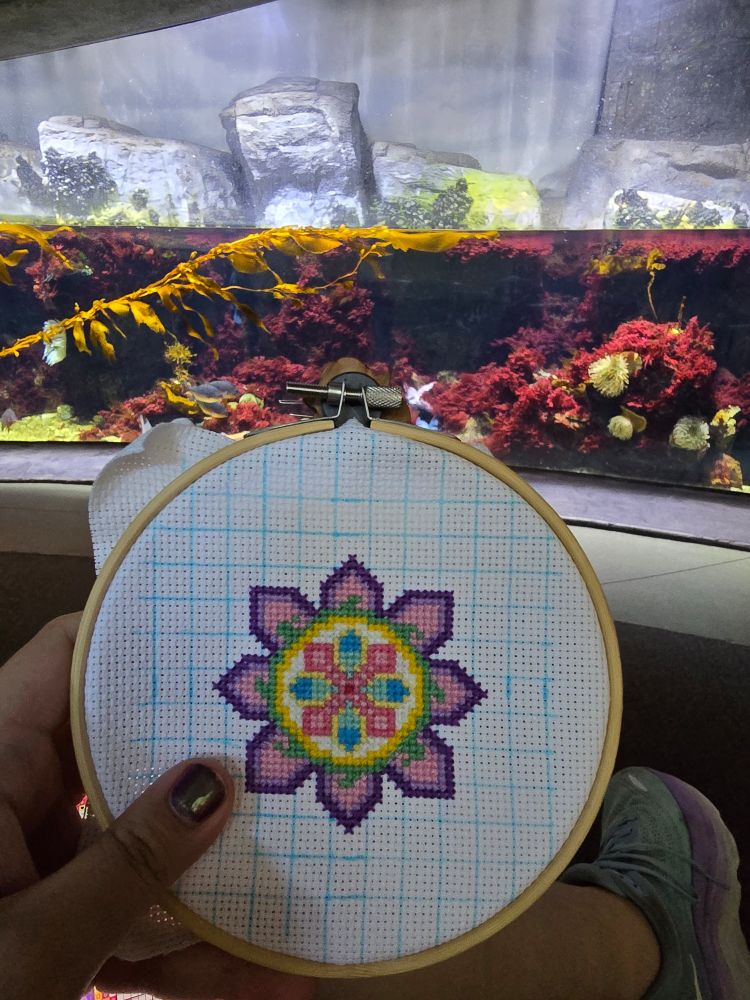 the complete cross stitch of an intricate 