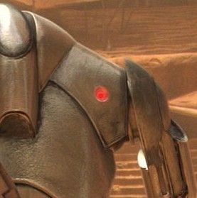 Close up of the little red sensor on the  chest of a B2 super battledroid from star wars