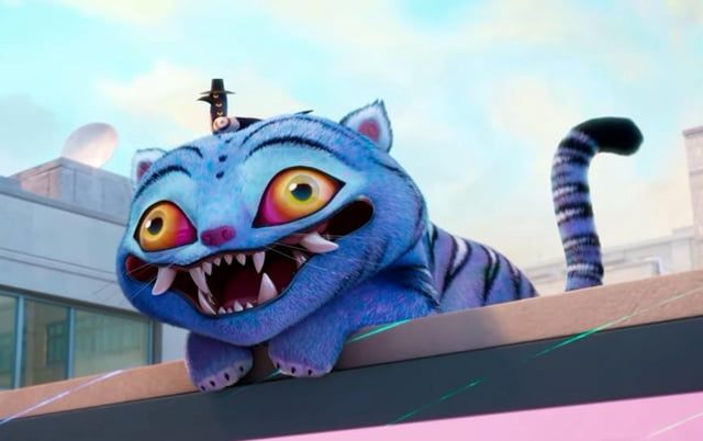 The Blue Tiger from KPop Demon hunters perched on a roof looking goofy, while the grouchy demon bird with a hat sits on his head. 