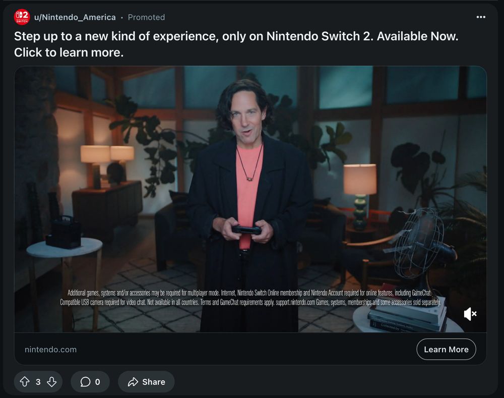 Paul Rudd in a trench coat with long hair in an ad screenshot from Reddit for Nintendo America