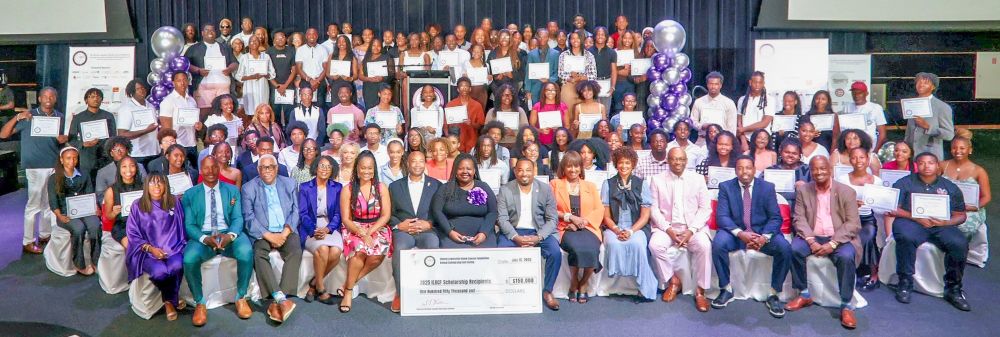 Illinois Legislative Black Caucus Foundation members and scholarship recipients pose for a group photo.