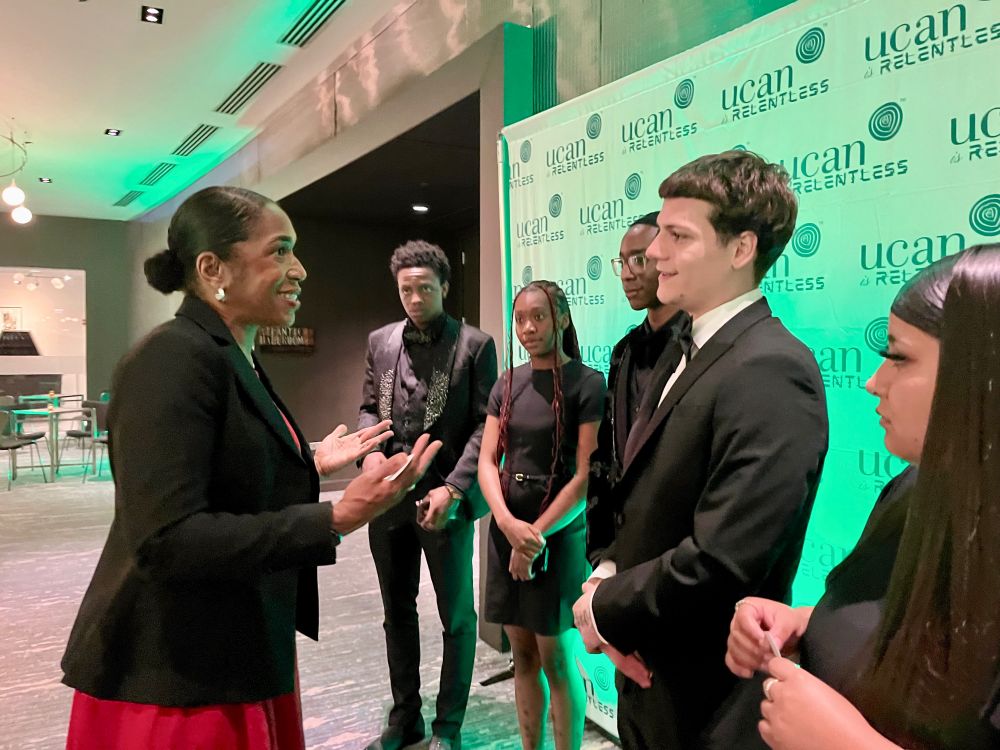Lieutenant Governor Stratton speaks with young guests at the event. 