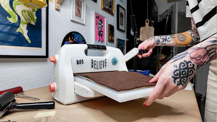 linprinting with die cutting machine. runningn the "sandwich" thru the machine. 