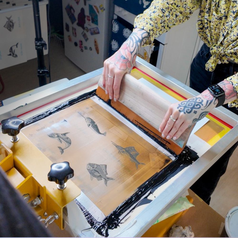 printing my fishes. doing my first pass on the screenprinting machine. view from top