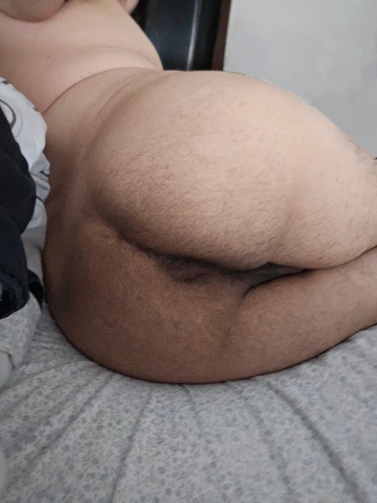 The Sweetest Boy laying on their side, hole begging to be filled.