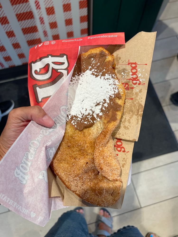 A cinnamon sugar split chocolate hazelnut spread covered Braver Tail (fried dough). 