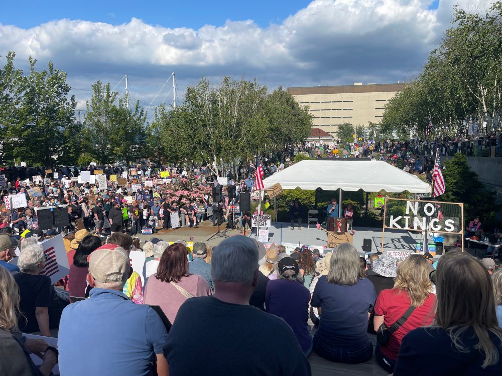 The stage at the Everett WA No Kings rally and some of the surrounding crowd. 