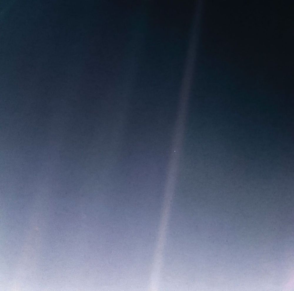1. The Pale Blue Dot is a photograph of Earth taken Feb. 14, 1990, by NASA’s Voyager 1 at a distance of 3.7 billion miles (6 billion kilometers) from the Sun. The image inspired the title of scientist Carl Sagan's book, "Pale Blue Dot: A Vision of the Human Future in Space," in which he wrote: "Look again at that dot. That's here. That's home. That's us."
NASA/JPL-Caltech. Public domain.