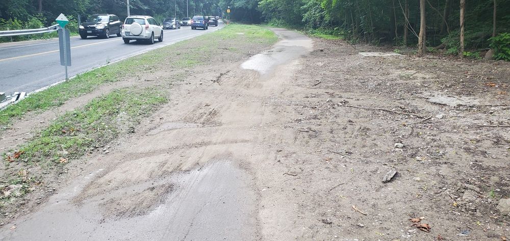 Mud on a multi-use trail post construction. Looking southeast. 