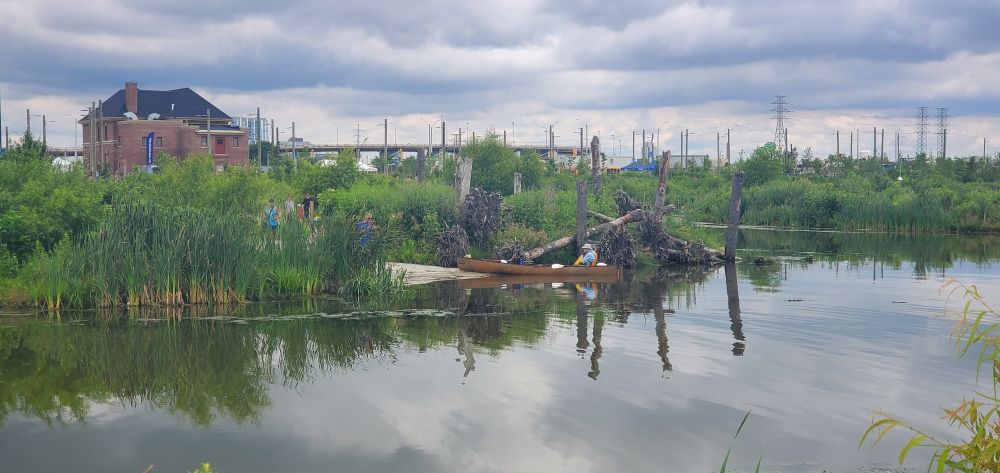 Person in a canoe on the new Don River. 