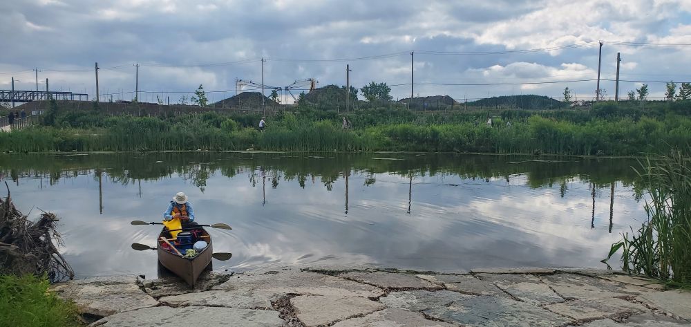 Person in a canoe on the new Don River. 