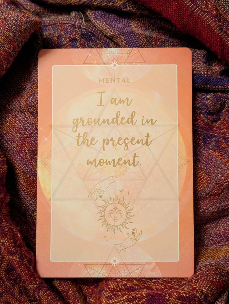 Card with text: I am grounded in the present moment. 