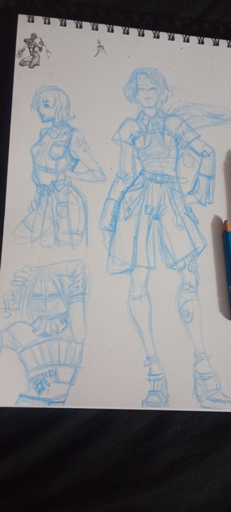 A page with fashion sketches, a full body on the right and two half bodies on the left. The fullbody wears a crop trenchcoat with short pants, one of the half bodies wear a top simulating denim construction and a skirt-pant simulating a button-up shirt with a tie included as a belt. The other half body has a top, a necklace simulating a skirt and long gloves simulating leg warmers