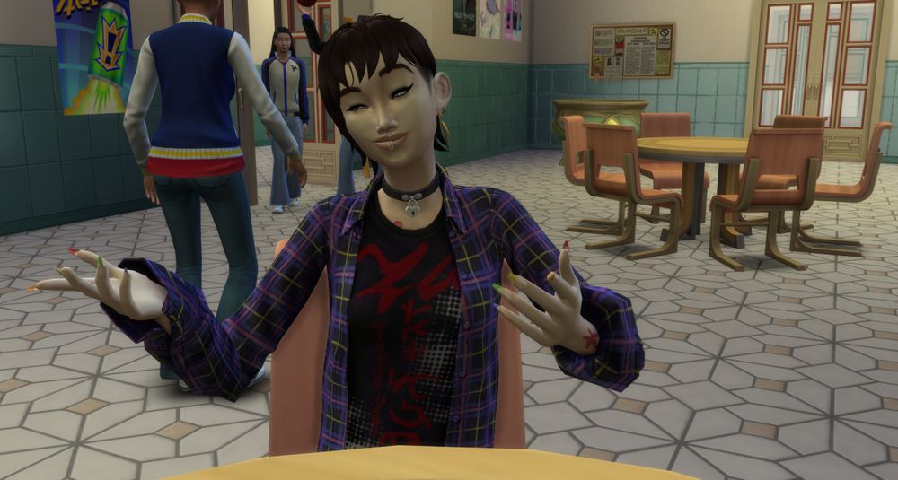 Nanami Ito as a teenager in high school. She has an alt-punk style with tattoos that are barely showing. She is gesturing while talking to her younger brother, Sho.
