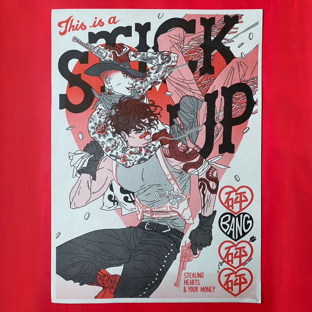 Photo of my two colour red and black riso print of two tattooed cowboys holding bags of money running away, looking over their shoulders. There’s typography of ‘this is a stick up’ interweaving them.