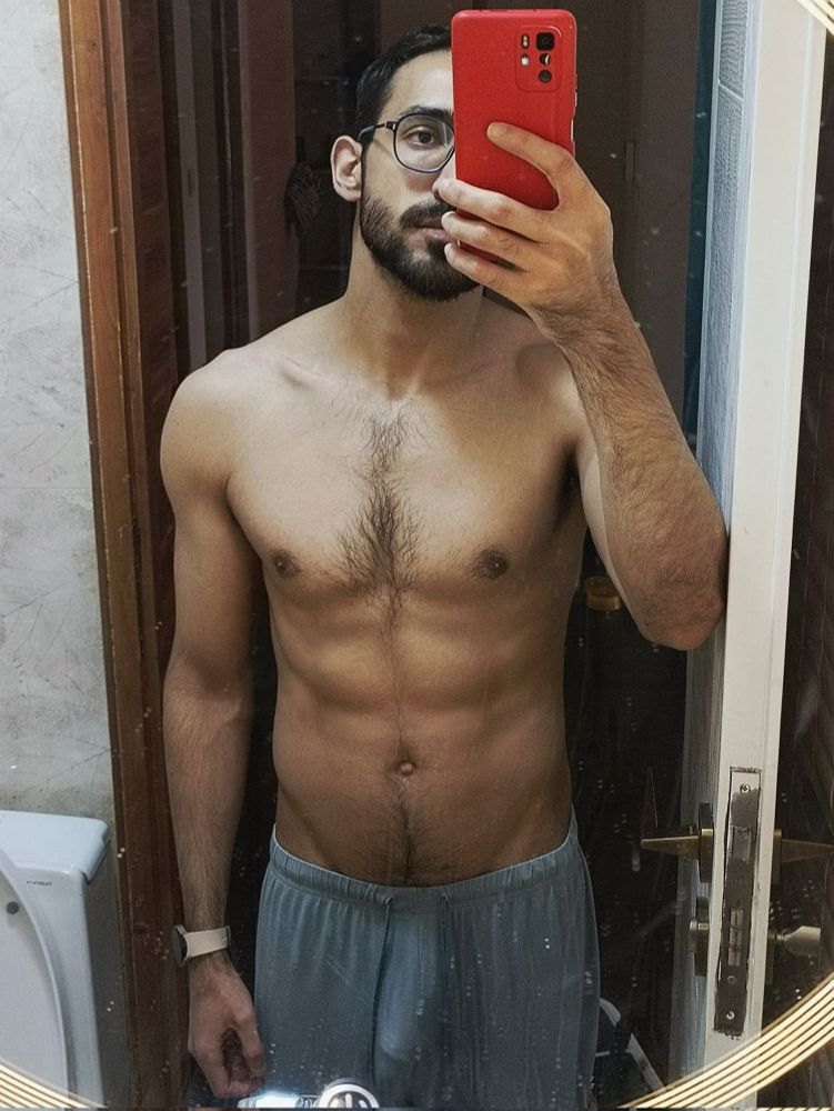 A bathroom mirror selfie. Shirtless wearing a revealing pair of pants. Vpl