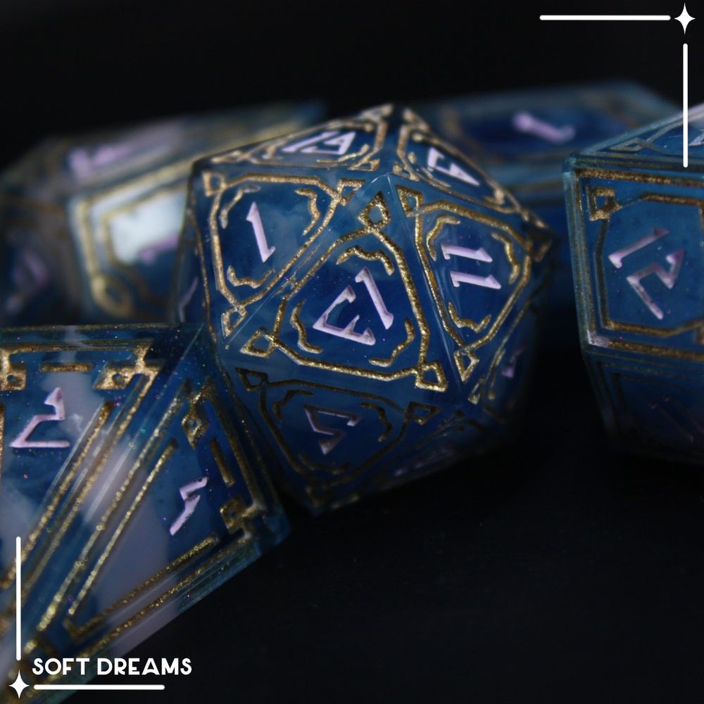Ornate dice set with Pink and blue colour palette. Gold borders and pastel pink numbers
