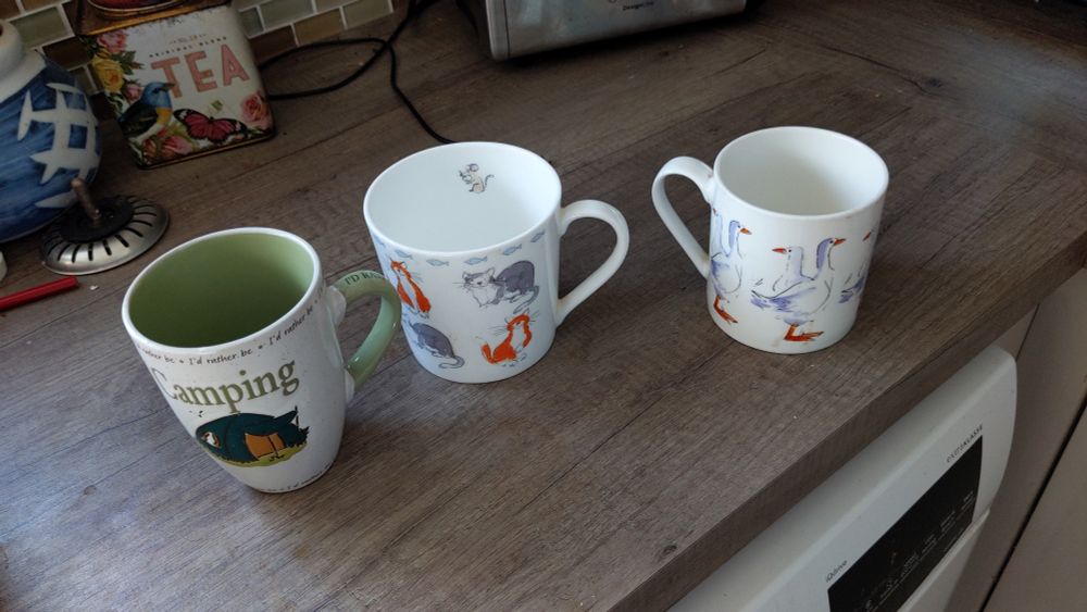 3 mugs with geese, cats and mouse and camping images