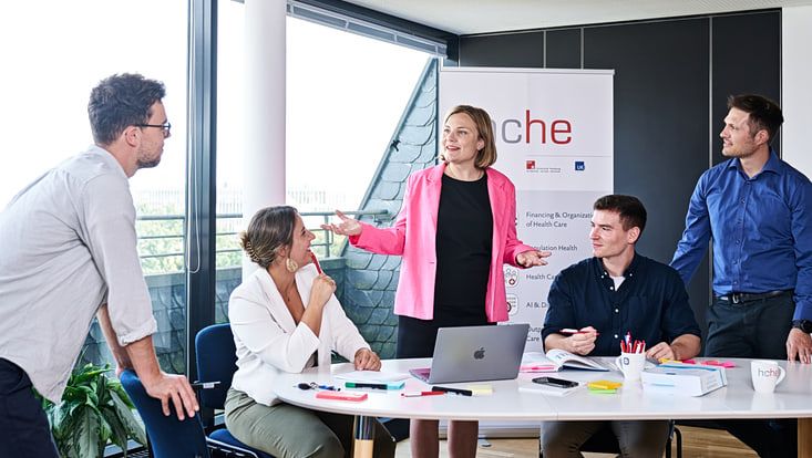 Group of researchers discussing