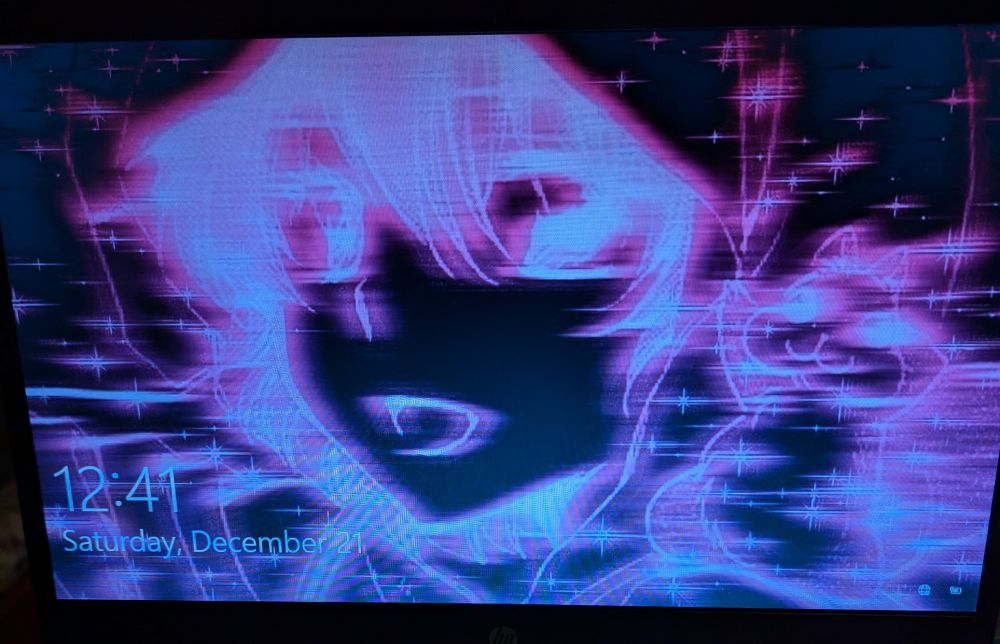 An intentionally blurred heavily edited image of an anime character outlined in pink, with a black background and pink glitter. It's been set as the lock screen for the login of a laptop.