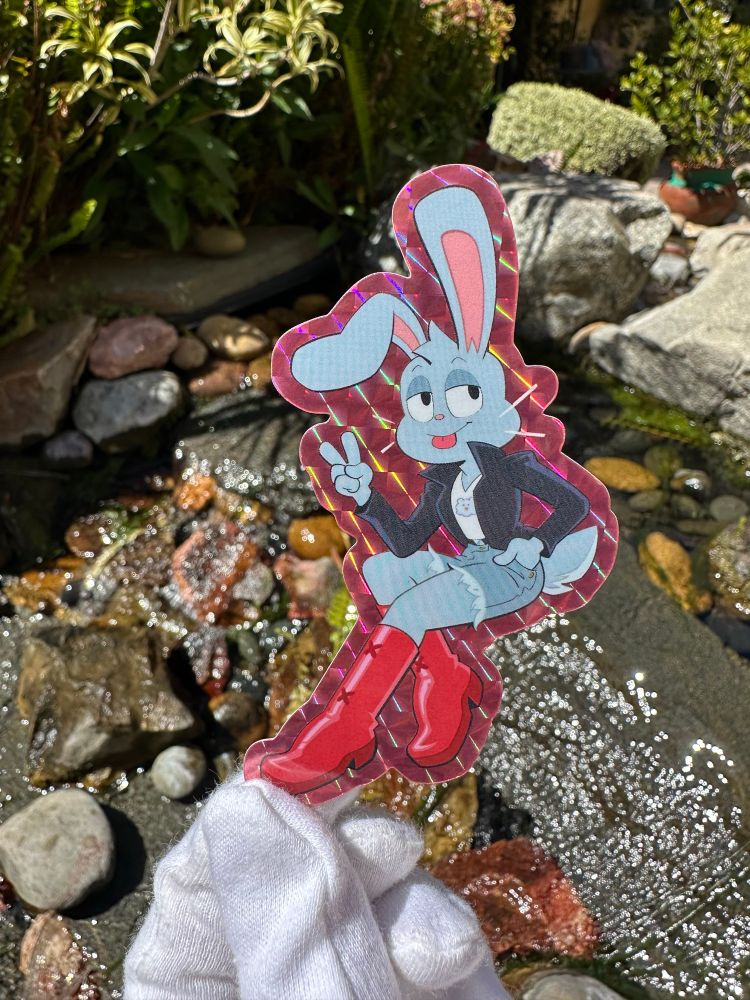 Photograph of a prismatic sticker of Tiffy the Bunny 