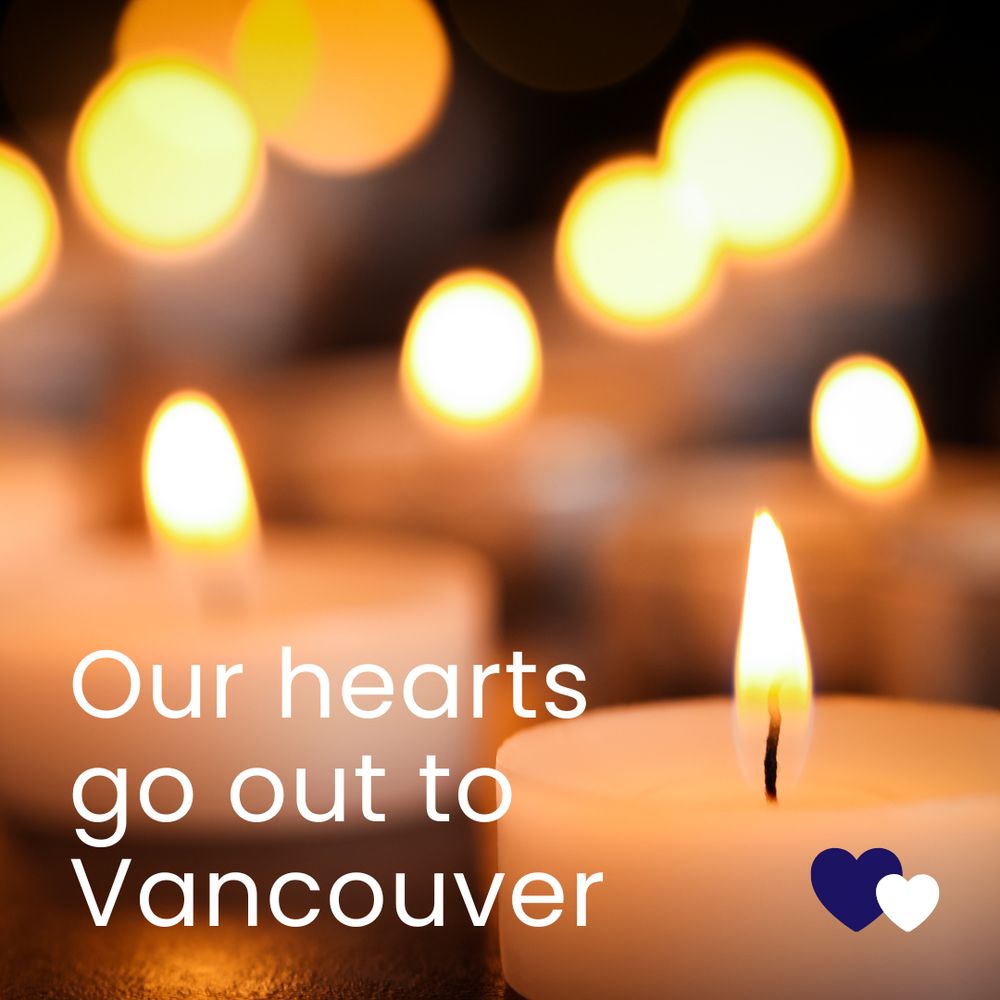Photo of numerous glowing candles. A navy blue and white graphic heart are displayed in the bottom right corner of the photo. Text reads: "Our hearts go out to Vancouver."