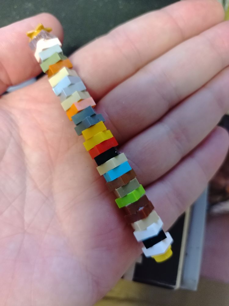 Stiming rolling bar the size of a hand made with 1x1 lego.