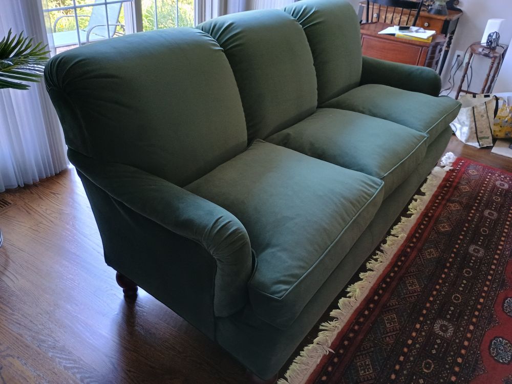 The big fucker in question, an oversized (and very heavy) couch redone in green velour. Velour is also very slippery and is not fun to try to grab onto desperately while your grip strength is failing