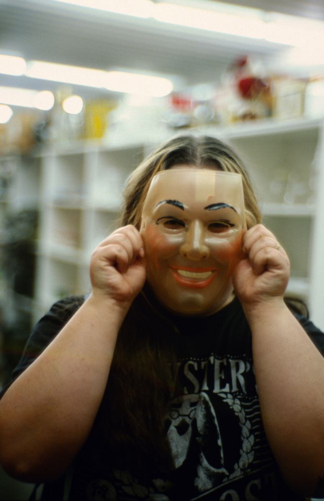 My wife with a horrific mask we found at this antique place 