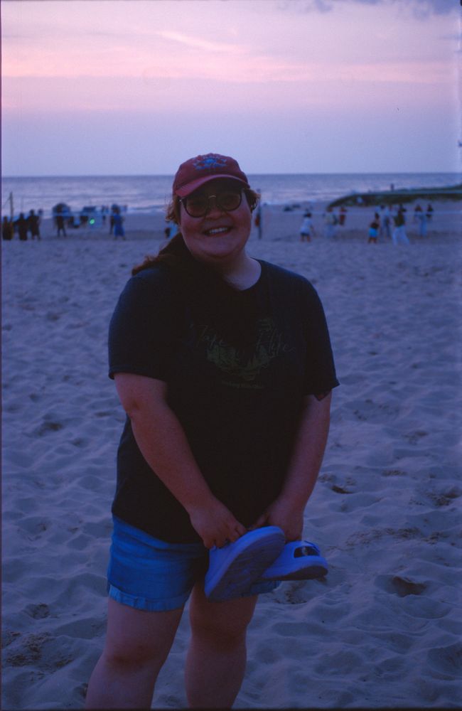 A pic of my beautiful wife on the beach in front of a nice pastel blue hour sunset