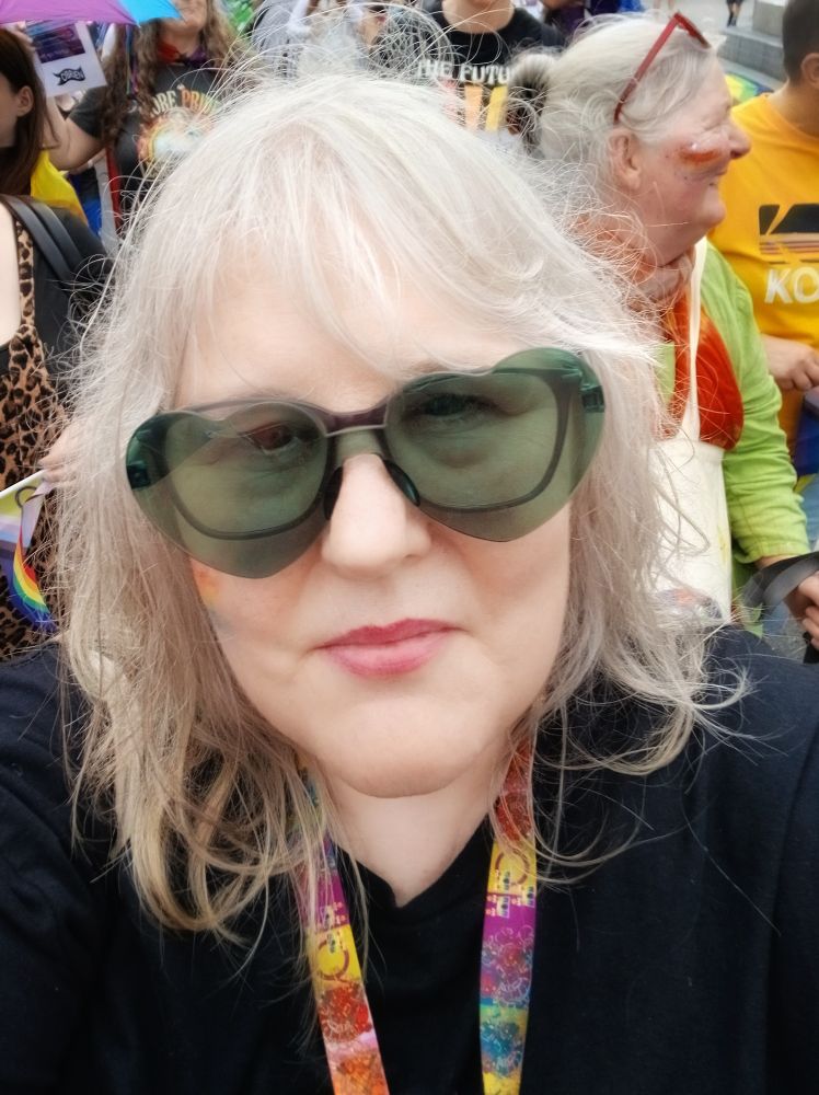 Me on the Dublin Pride march with Children's Books Ireland I borrowed teal heart shades 
