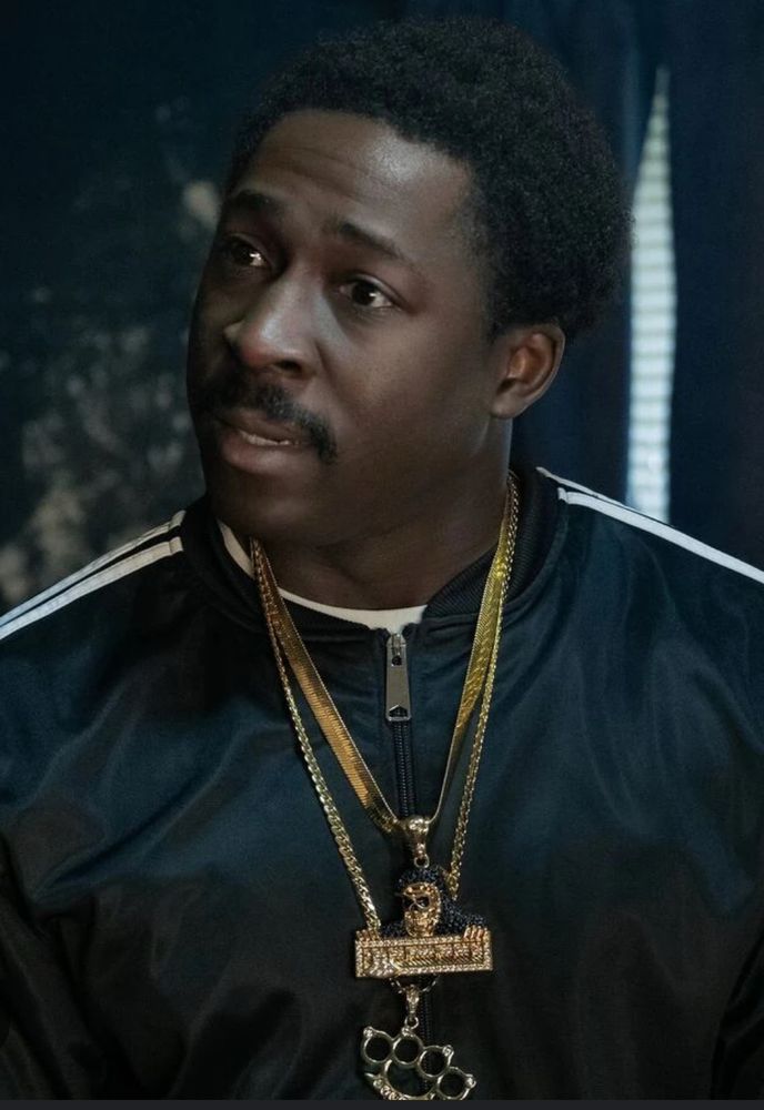 A picture of an ol’ fuck ass hatin ass nigga named Lamar Silas from the show BMF on STARZ.