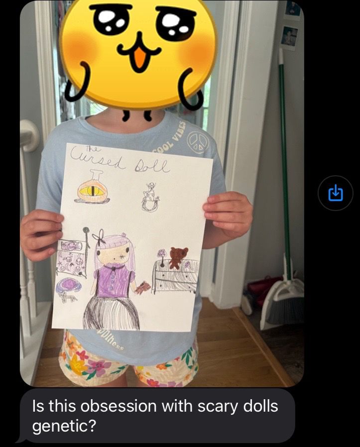 a text from my elder sister reading, "Is this obsession with scary dolls genetic?", and a photo of my niece holding a drawing she made of a "Cursed doll"