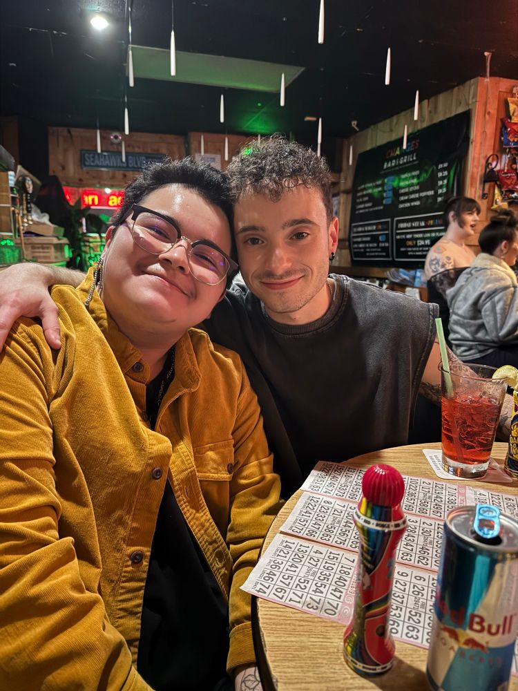 Chris and Elijah posing at Bingo 