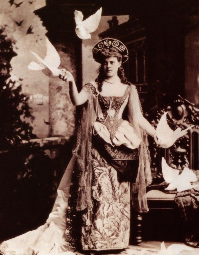 Alva Vanderbilt in a fabulously elaborate Victorian dress.