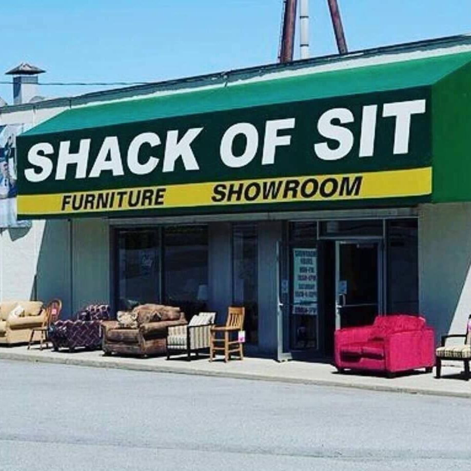 Sign for furniture showroom that reads SHACK OF SIT