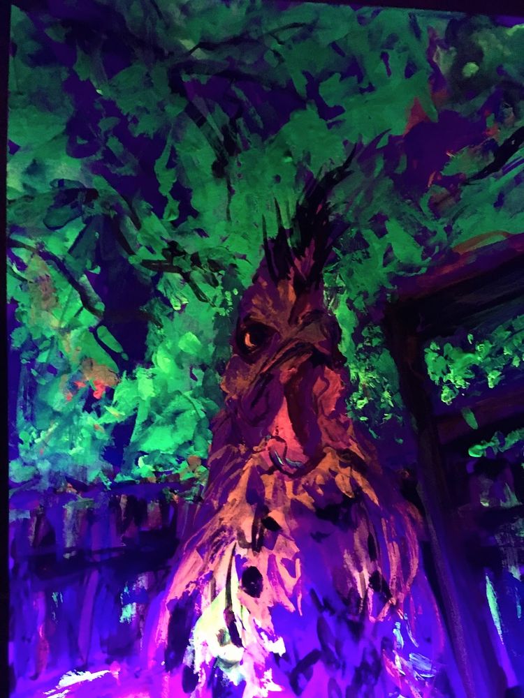 a blacklight painting of an Appenzeller Spitzhauben in front of a fence

I was messing around with the fluorescent paint and realized we had an anti-mosquito device with a blacklight