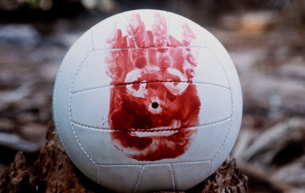 A volleyball with a face painted on it from the movie Cast Away with Tom Hanks