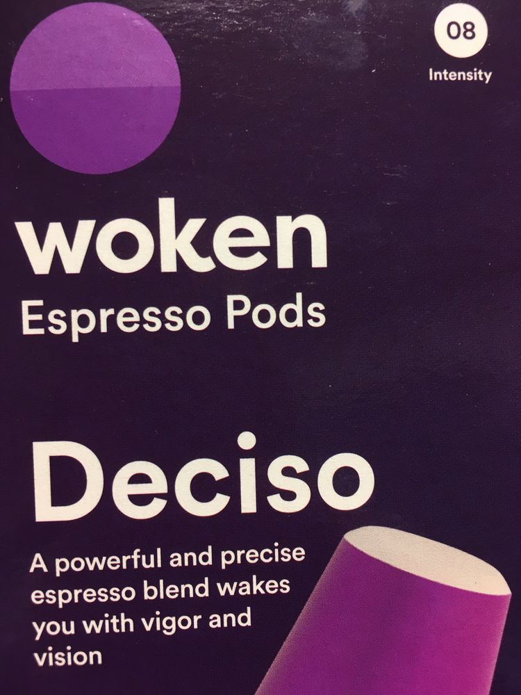 A purple package of woken espresso pods Decisio blend wakes you up with vigor and vision