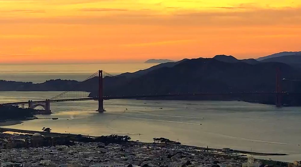 Golden Gate Bridge at sunset from the Salesforce Tower cam