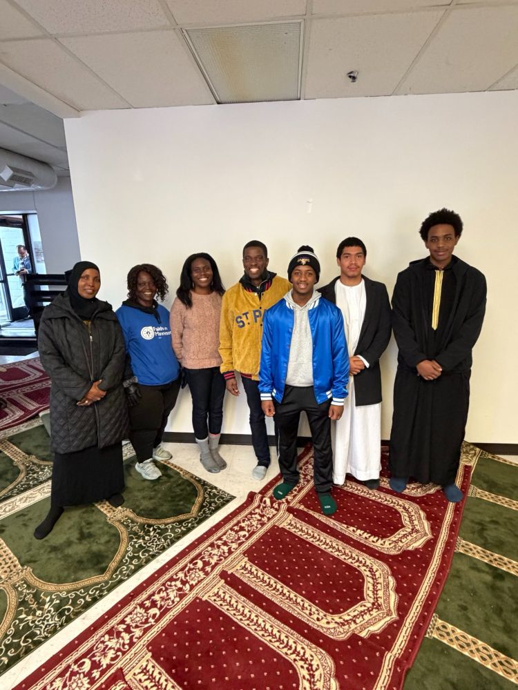 FIMNA leaders pose for photo with Mayor Melvin Carter