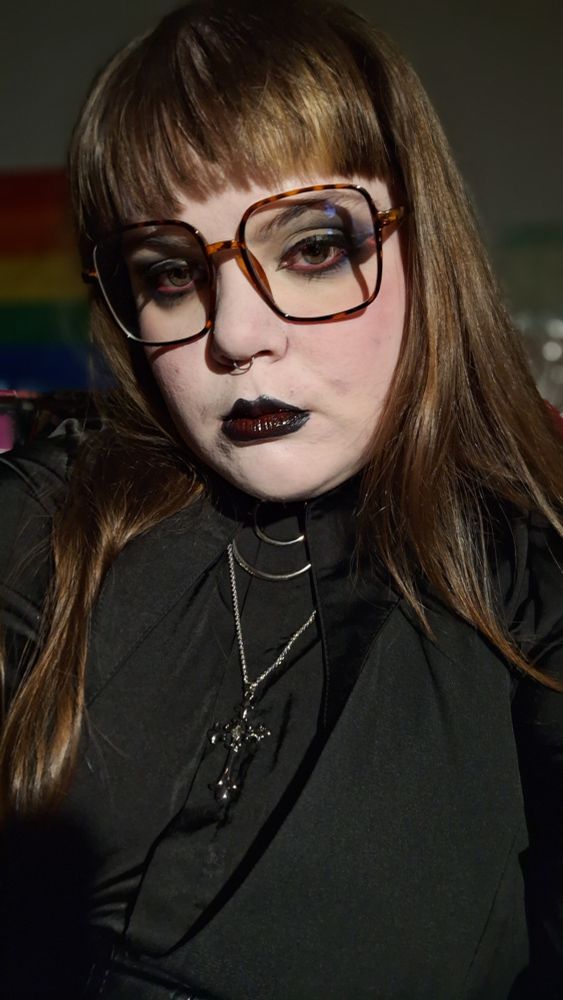 Moss showing off their black and red make up