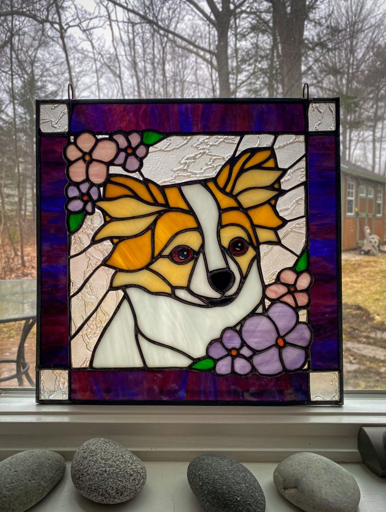 Fancy chihuahua with flowers and a colorful square frame