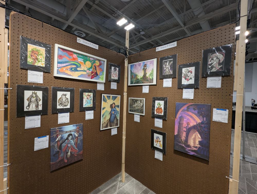 Panels featuring original artwork by Grace P. Fong on sale at Worldcon 2025 in Seattle.